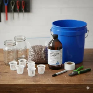 Notwendiges Zubehör fĂŒr ein DIY kratky hydroponik system wie Netztöpfe und NĂ€hrstoffe.
